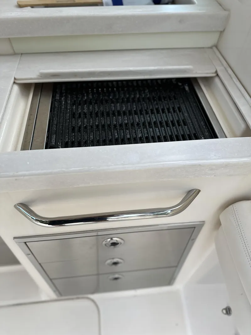 Slide: The Image of Built-in grill and storage on 2017 Grady-White Freedom 375 boat. - 49