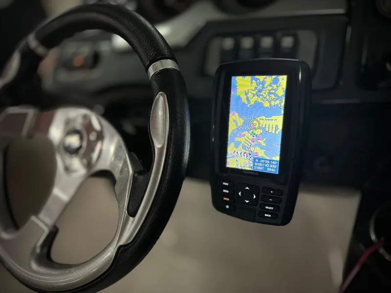 Slide: The Image of Steering wheel and GPS of 2013 Monterey 214 SS boat. - 25