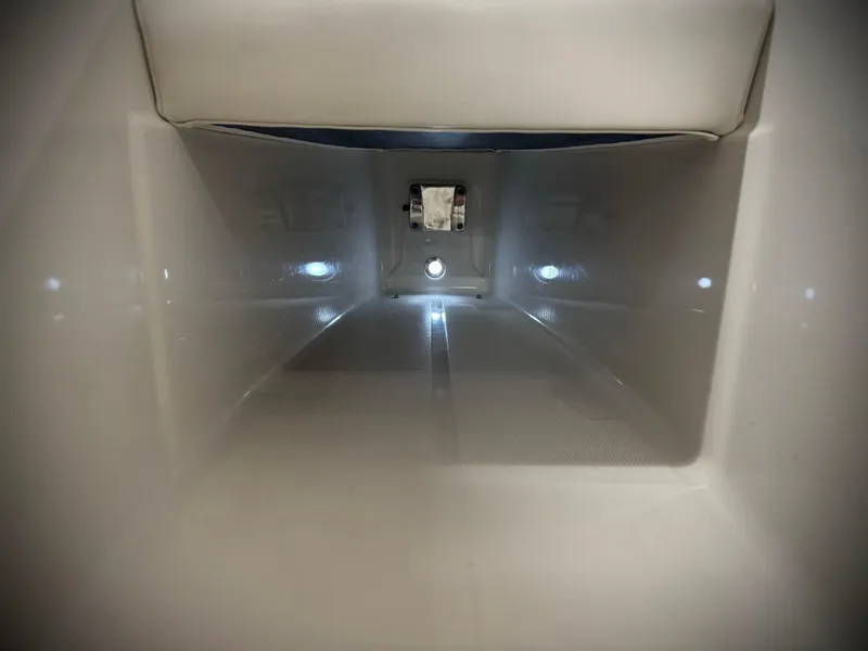 Slide: The Image of Interior view of 2013 Monterey 214 SS boat compartment, featuring clean, spacious design. - 27