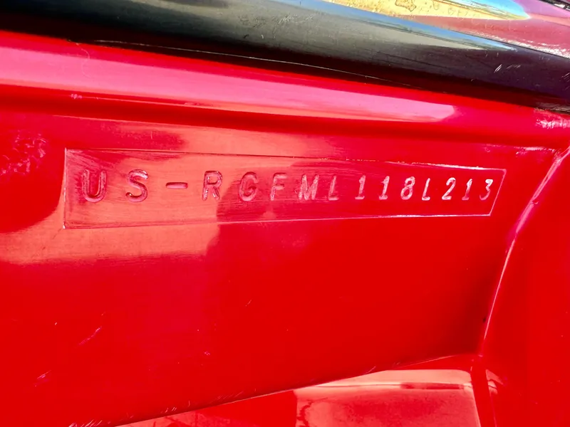 Slide: The Image of Red 2013 Monterey 214 SS boat with visible hull identification number. - 30