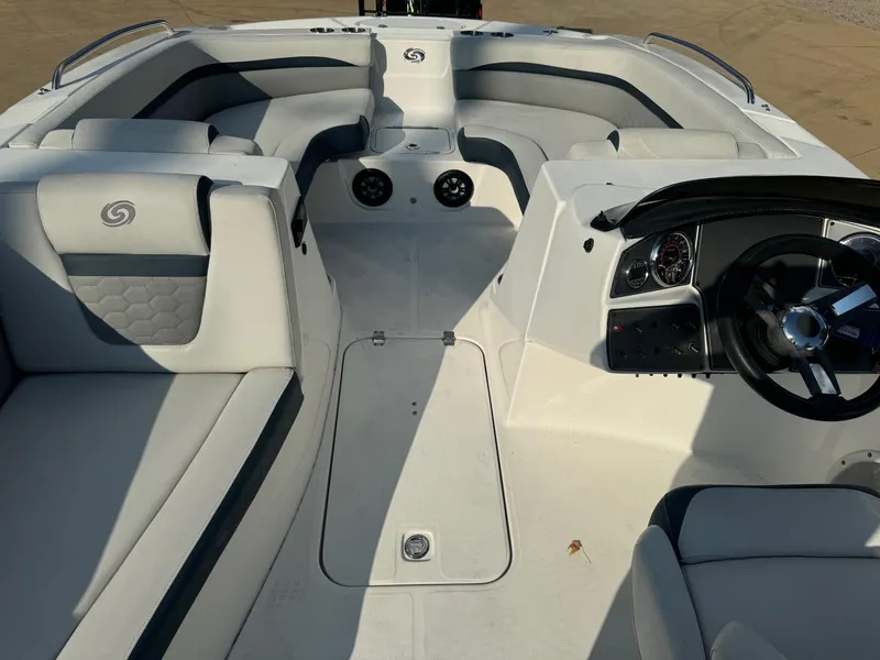 Slide: The Image of 2022 Hurricane SS 192RL boat interior with modern seating and steering console. - 4