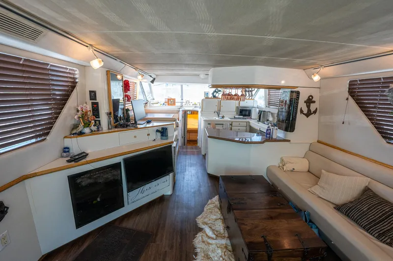 Slide: The Image of Luxurious interior of 1995 Sea Ray 550 Sedan Bridge yacht with modern amenities. - 22