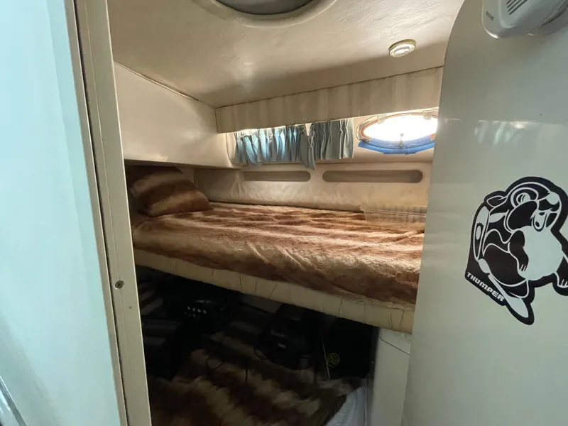 Slide: The Image of Cozy cabin interior of 1995 Sea Ray 550 Sedan Bridge yacht. - 34