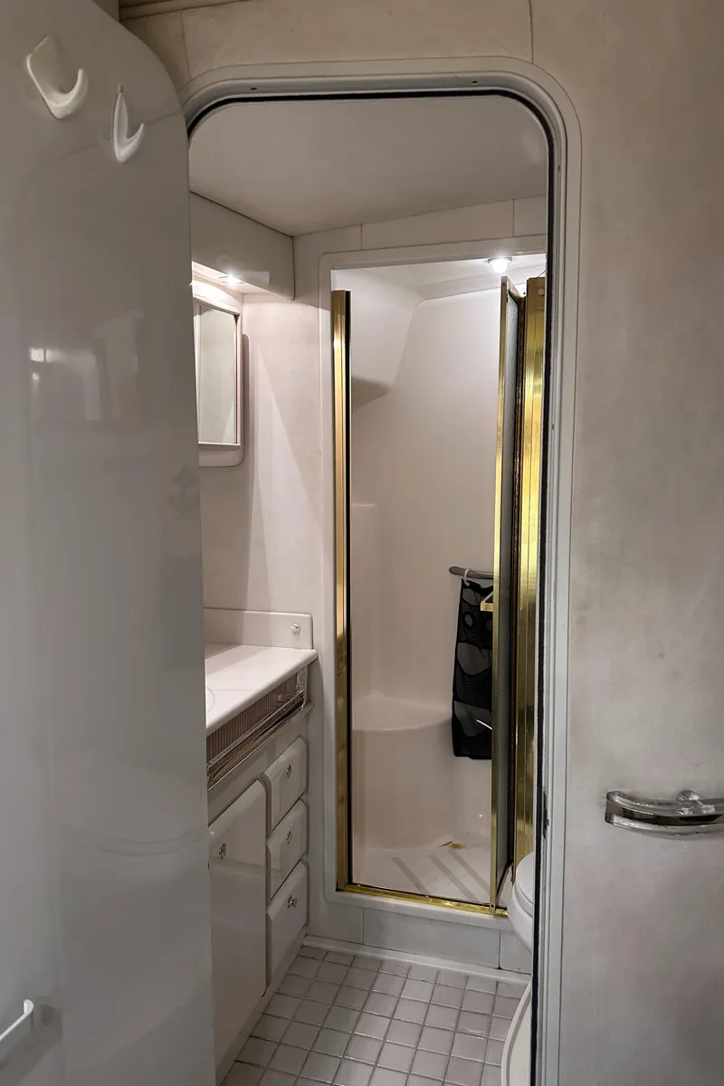 Slide: The Image of Bathroom interior of 1995 Sea Ray 550 Sedan Bridge yacht. - 41