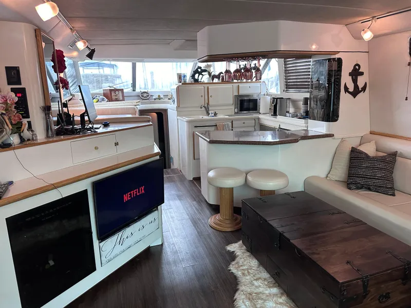 Slide: The Image of Luxurious interior of 1995 Sea Ray 550 Sedan Bridge yacht with modern amenities. - 45