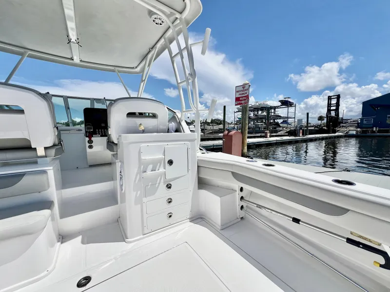 Slide: The Image of 2022 Stamas 326 Aegean boat interior, featuring sleek design and spacious seating at the marina. - 11