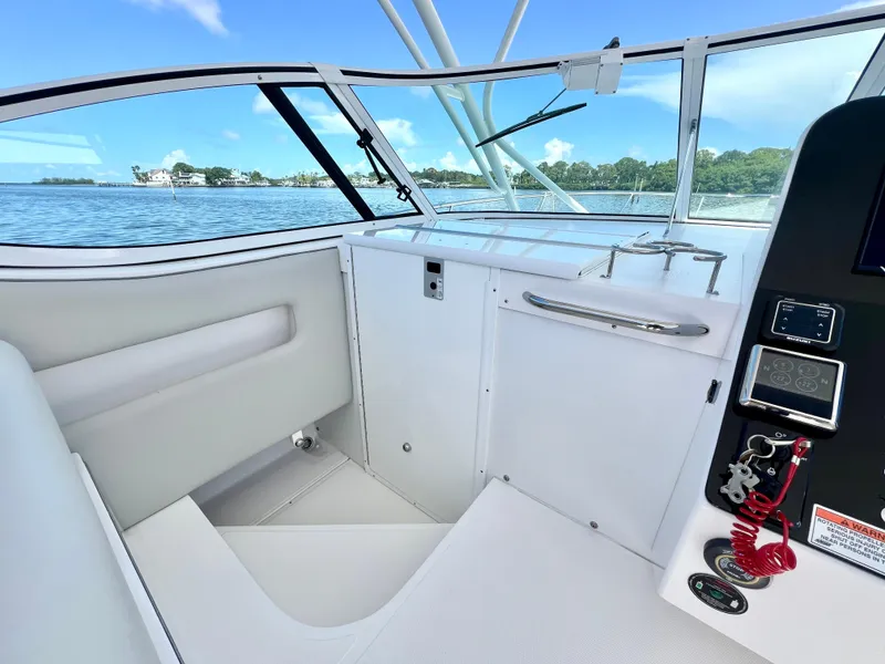 Slide: The Image of 2022 Stamas 326 Aegean boat interior with sleek design and modern controls. - 18