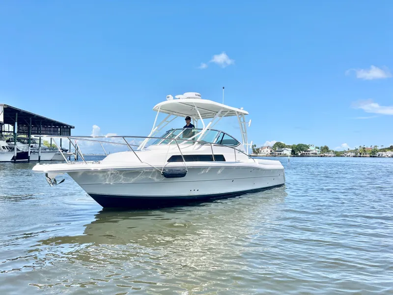 Slide: The Image of 2022 Stamas 326 Aegean boat on calm water under clear blue sky. - 2