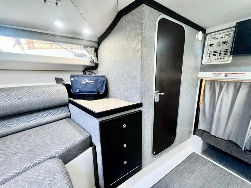 Slide: The Image of Interior of 2022 Stamas 326 Aegean boat, featuring modern seating and storage. - 27