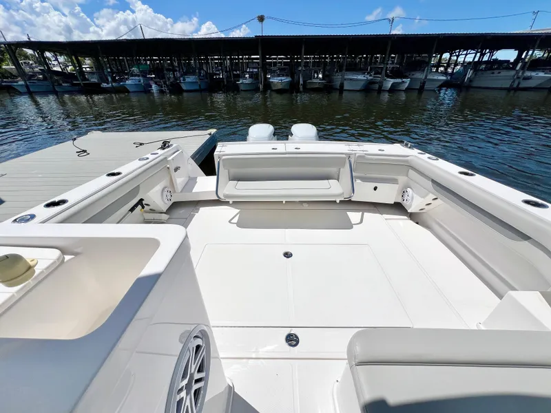 Slide: The Image of 2022 Stamas 326 Aegean boat interior, spacious deck, docked at marina. - 8