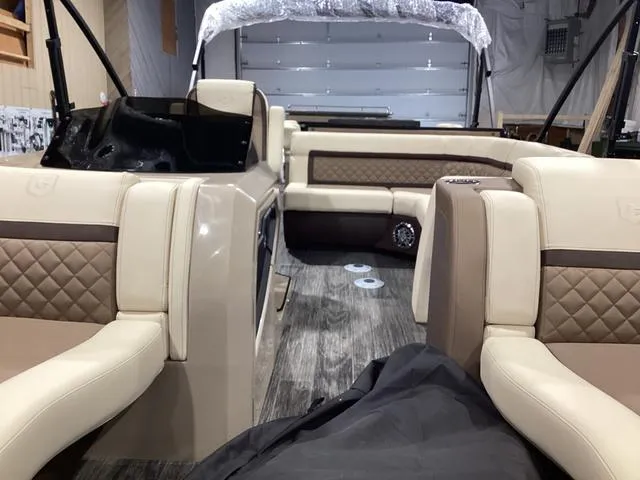 Slide: The Image of 2024 Godfrey Aqua Patio Entertainment 255 CBE interior with luxurious seating and modern design. - 12