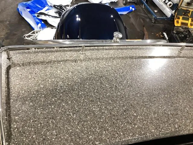 Slide: The Image of 2024 Godfrey Aqua Patio Entertainment 255 CBE boat with sleek countertop detail. - 26