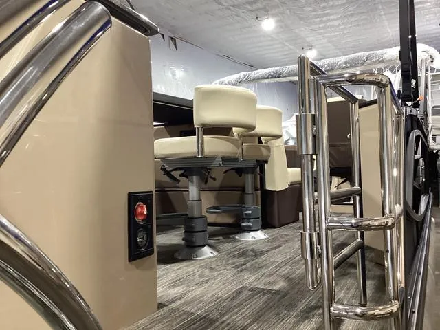 Slide: The Image of 2024 Godfrey Aqua Patio Entertainment 255 CBE interior with modern seating and sleek design. - 6