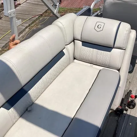 Slide: The Image of 2019 Godfrey Sw2286SB boat seat with light gray upholstery. - 11
