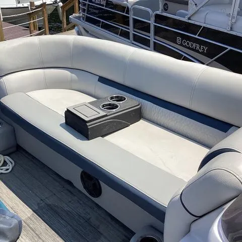 Slide: The Image of 2019 Godfrey Sw2286SB pontoon boat with comfortable seating and cup holders. - 5