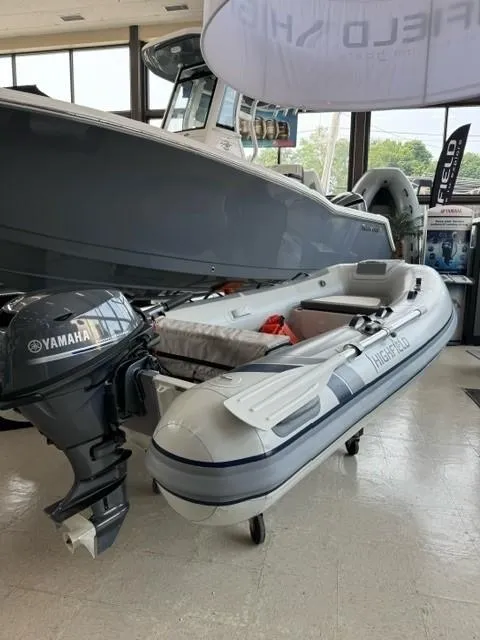 Slide: The Image of 2024 Highfield Classic 310 inflatable boat with Yamaha motor in showroom. - 3