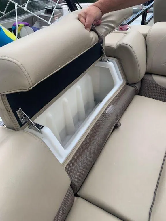 Slide: The Image of 2020 Regency 230 DL3 boat seat with built-in storage compartment. - 27