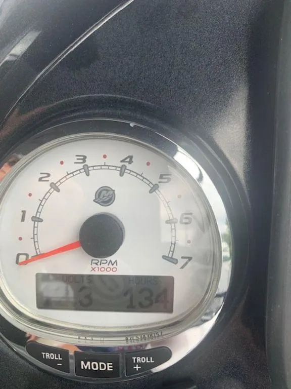 Slide: The Image of Close-up of 2020 Regency 230 DL3 tachometer displaying RPM and digital readout. - 39