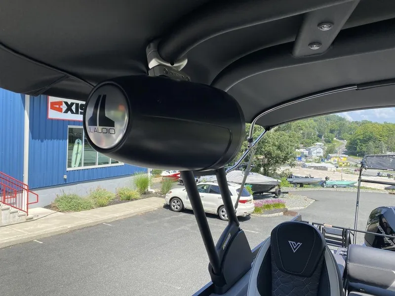 Slide: The Image of JL Audio speaker on 2025 Viaggio Diamante 24S boat, outdoor setting. - 18