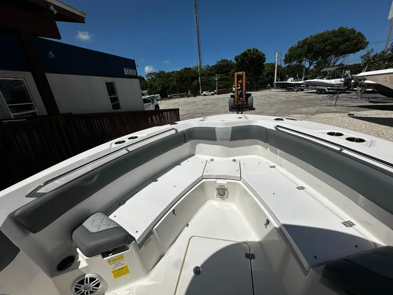 Slide: The Image of 2024 NauticStar 242 OSL boat interior with spacious seating and modern design. - 13