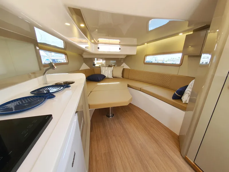 Slide: The Image of Luxurious interior of 2025 Hanover 387 yacht with modern seating and elegant design. - 4