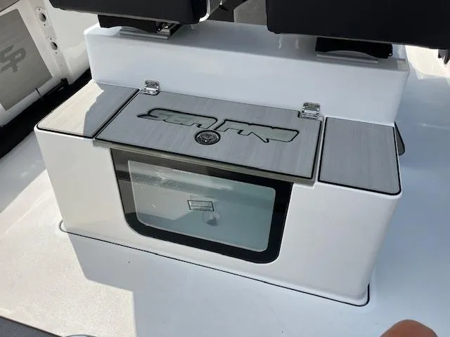 Slide: The Image of 2025 Sea Pro 245 FLX boat interior with storage compartment. - 11