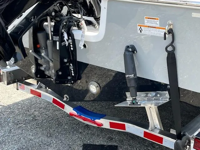 Slide: The Image of 2025 Sea Pro 245 FLX boat trailer hitch and motor detail. - 17