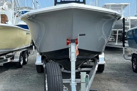 Slide: The Image of 2025 Sea Pro 245 FLX boat on trailer, front view. - 5