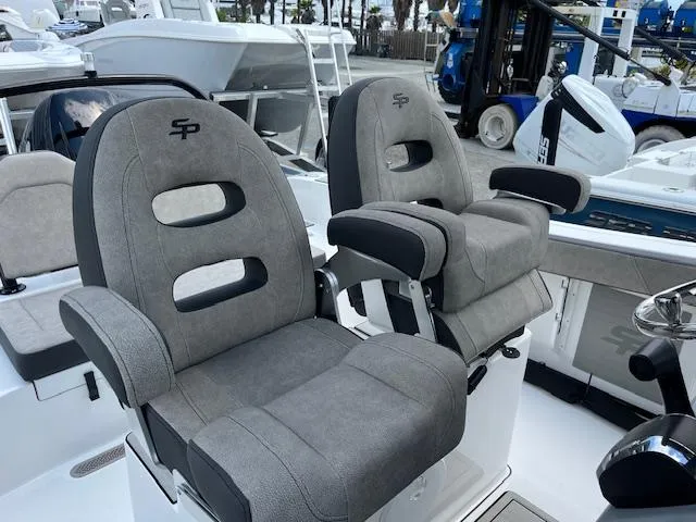 Slide: The Image of 2025 Sea Pro 245 FLX boat seats, gray upholstery, modern design. - 8