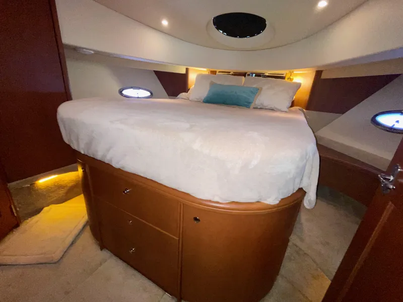 Slide: The Image of Luxurious bedroom interior of 2006 Silverton 43 Sport Bridge yacht. - 16