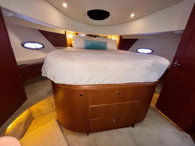 Slide: The Image of Luxurious bedroom interior of 2006 Silverton 43 Sport Bridge yacht. - 17