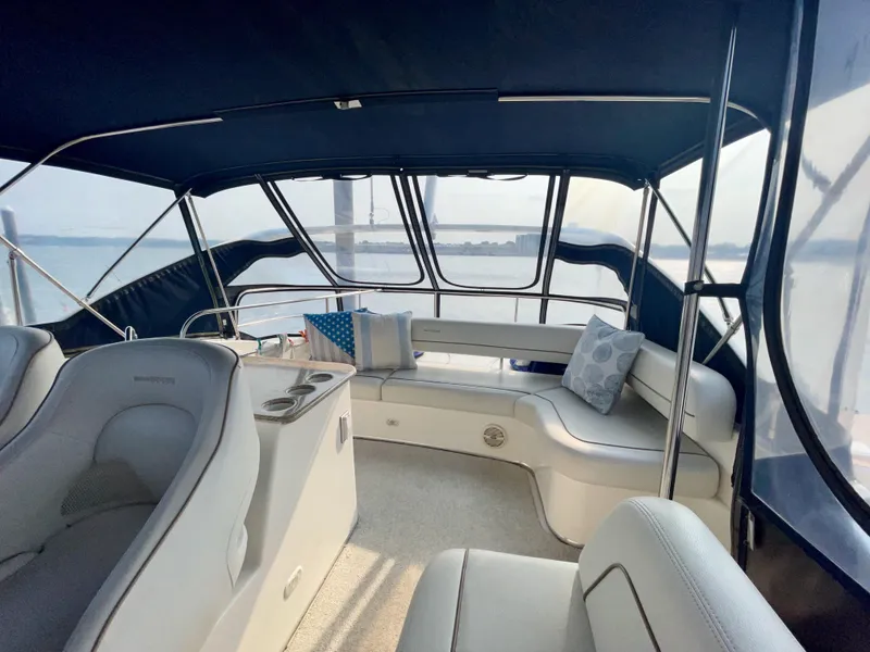 Slide: The Image of 2006 Silverton 43 Sport Bridge interior with seating and panoramic windows. - 36