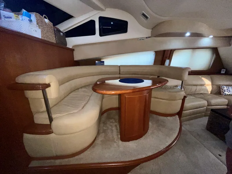 Slide: The Image of Luxurious interior of 2006 Silverton 43 Sport Bridge yacht with plush seating. - 9
