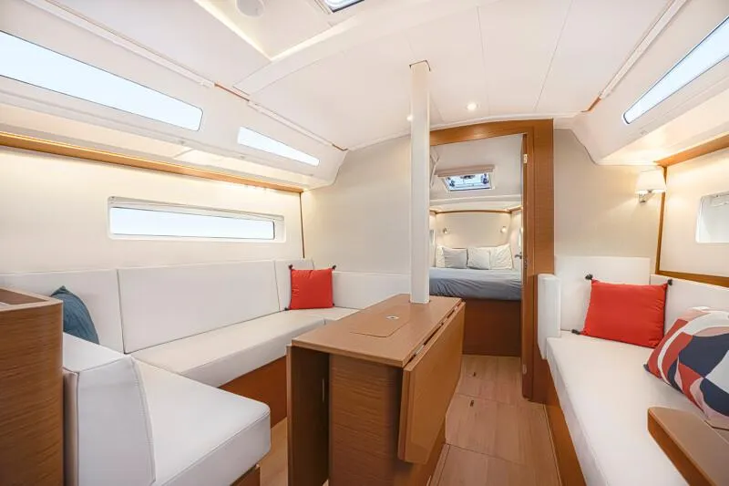 Slide: The Image of Luxurious interior of 2025 Jeanneau 380 yacht with modern seating and elegant design. - 9