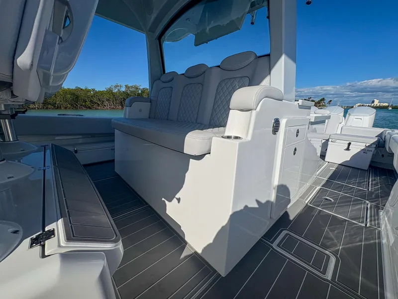Slide: The Image of 2024 HCB 53' Suenos luxury boat interior with sleek seating and modern design. - 44