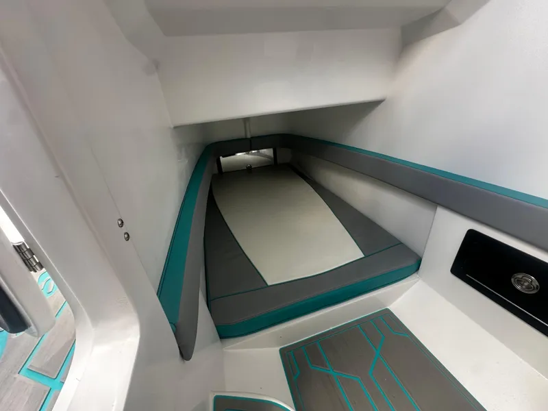 Slide: The Image of 2021 Renegade 38 Open cabin interior with modern gray and teal design. - 21