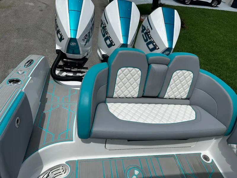 Slide: The Image of 2021 Renegade 38 Open boat with triple engines and stylish seating. - 7