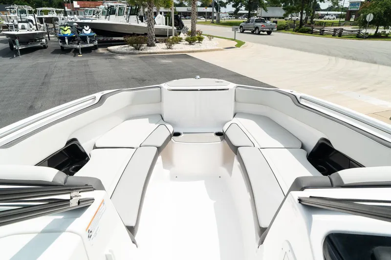 Slide: The Image of 2024 Yamaha AR250 boat interior with spacious seating and modern design. - 18