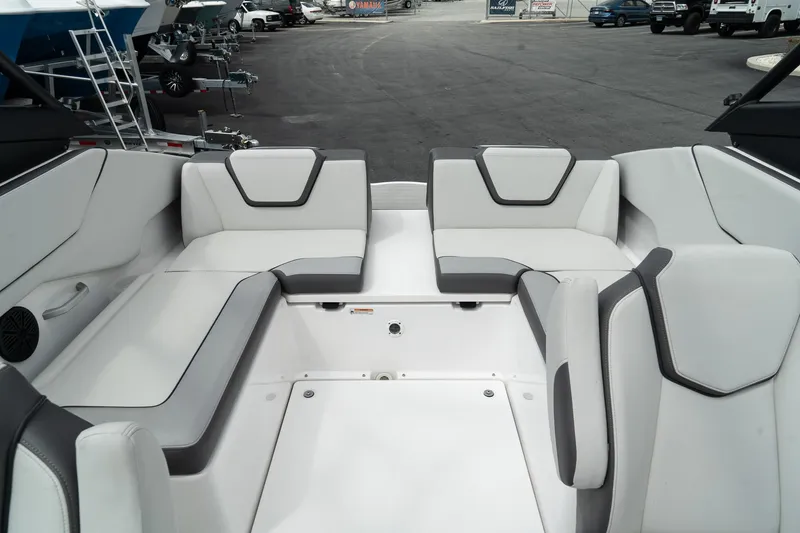 Slide: The Image of 2024 Yamaha Boats AR250 interior seating, featuring modern design and comfortable upholstery. - 23