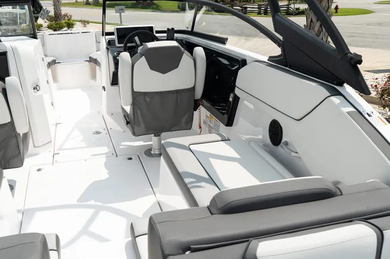 Slide: The Image of 2024 Yamaha Boats AR250 interior with modern seating and sleek design. - 9
