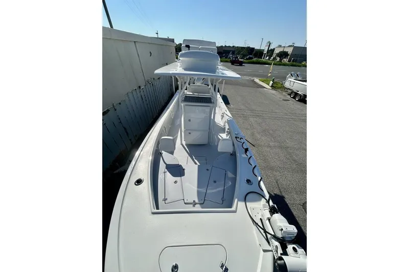 Slide: The Image of 2025 Pair Customs 24 Center Console MV boat, sleek design, spacious deck, modern features. - 12