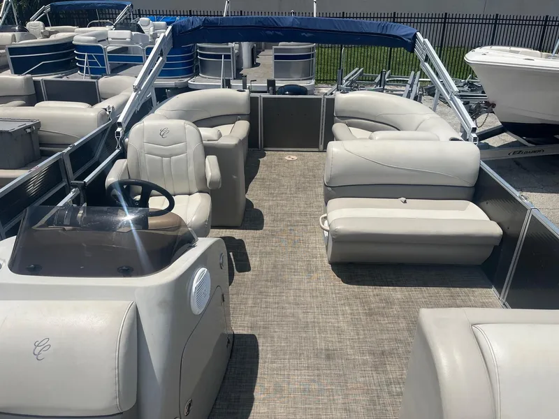 Slide: The Image of 2022 Cypress Cay Seabreeze 232 pontoon boat with spacious seating and modern design. - 5