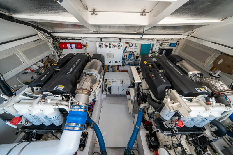 Slide: The Image of Engine room of 2020 Cabo 40 Express boat with dual Volvo Penta engines. - 22
