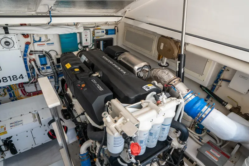 Slide: The Image of Engine room of 2020 Cabo 40 Express boat with Volvo Penta engine. - 23