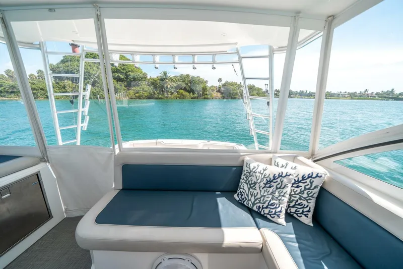 Slide: The Image of Interior view of 2020 Cabo 40 Express yacht with scenic ocean backdrop. - 55