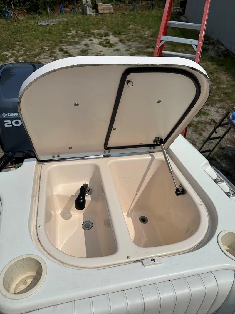 Slide: The Image of Open storage compartment on 2001 Grady-White 282 Sailfish boat. - 16