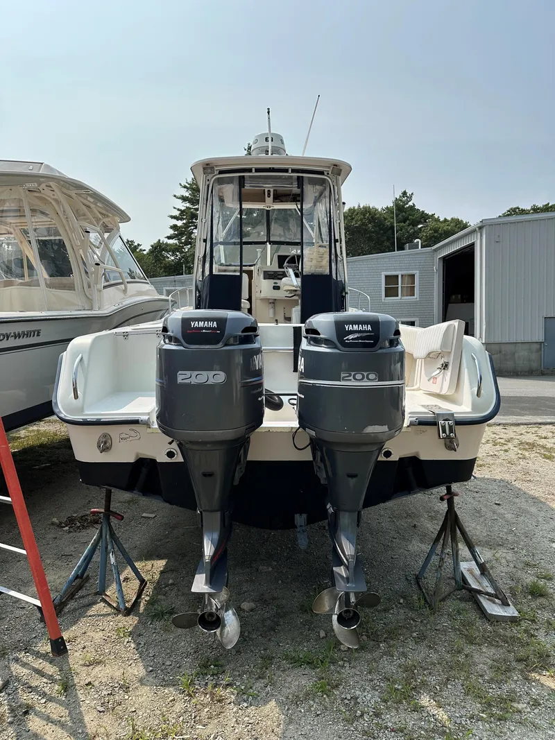 Slide: The Image of 2001 Grady-White 282 Sailfish boat with dual Yamaha 200 engines on stands. - 5