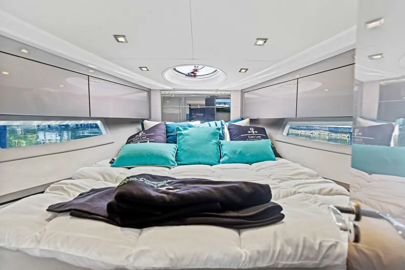 Slide: The Image of Luxurious interior of 2022 Schaefer 400 Coupe yacht with plush bedding. - 11