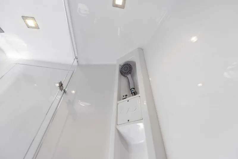 Slide: The Image of Shower area in 2022 Schaefer 400 Coupe yacht, featuring modern fixtures and sleek design. - 15