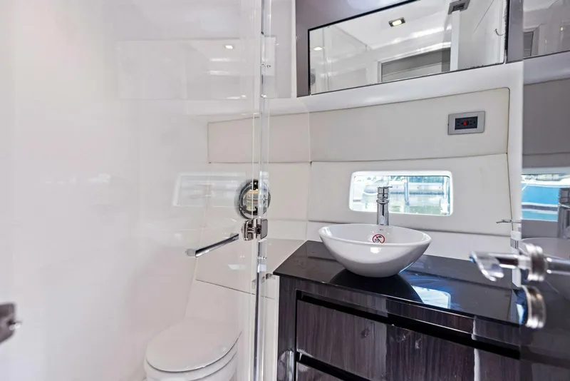 Slide: The Image of Modern bathroom in 2022 Schaefer 400 Coupe yacht with sleek fixtures and elegant design. - 16